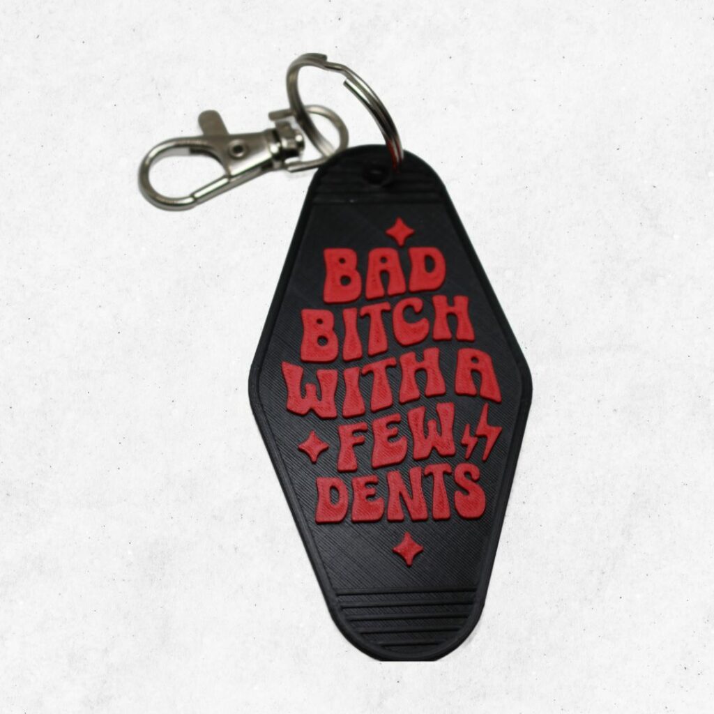 Bad Bitch With a Few Dents Keyring