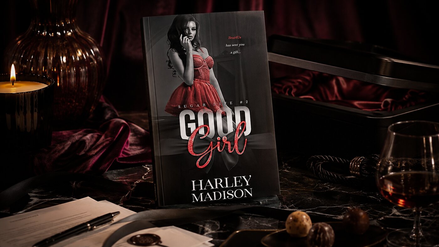 Good Girl by Harley Madison, book two of the Sugar Life series, beside a contract, a pen and a toy box