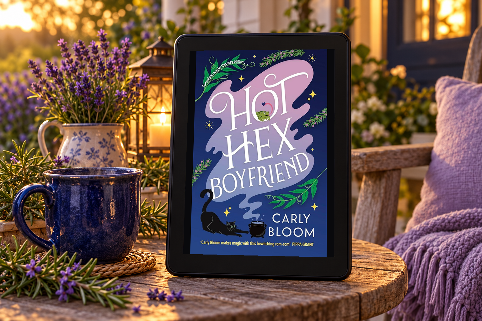 Hot Hex Boyfriend on a Kindle beside lavender and a blue mug on a cottage porch.
