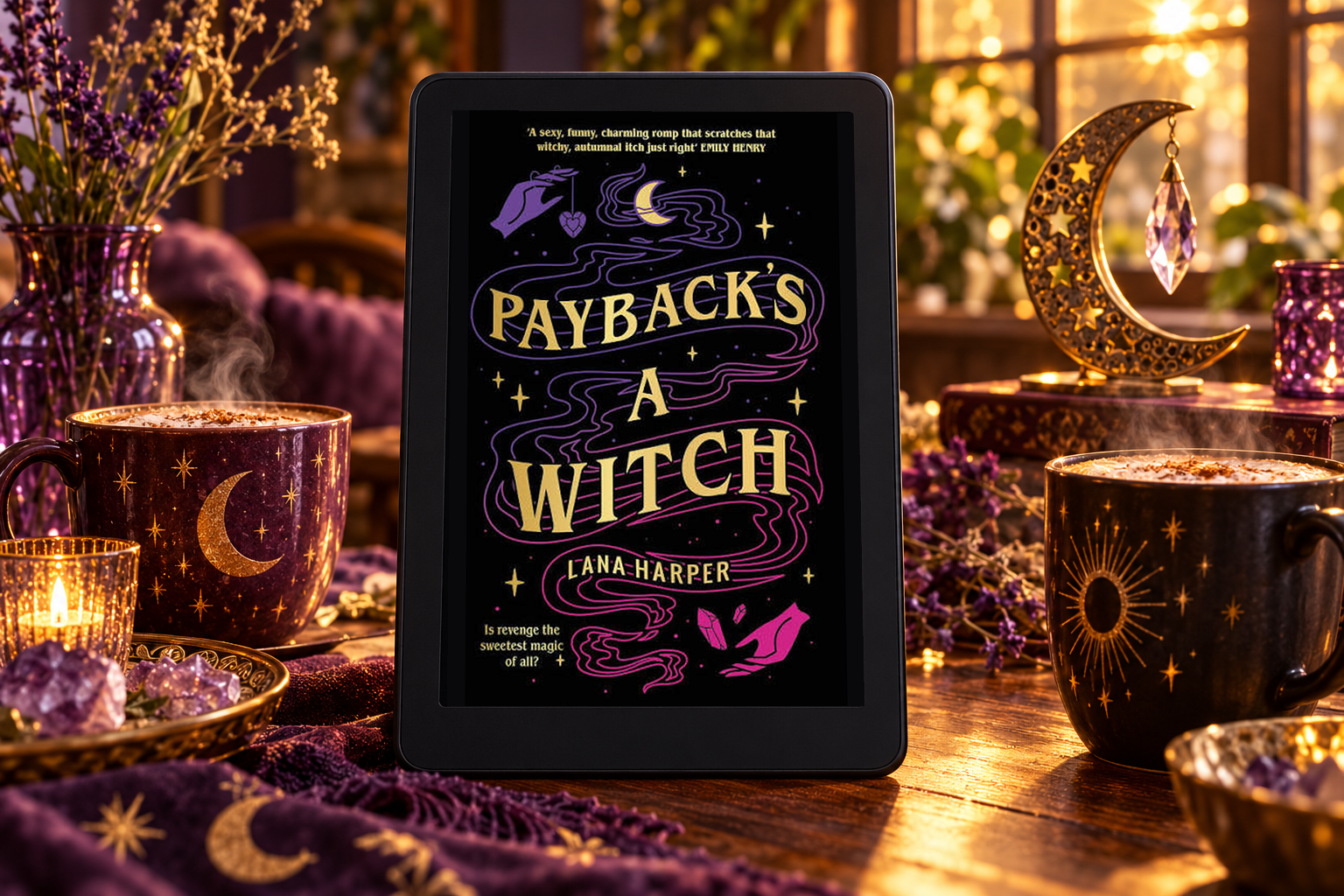 Payback's a Witch on a Kindle between two mugs in a purple and gold reading nook.