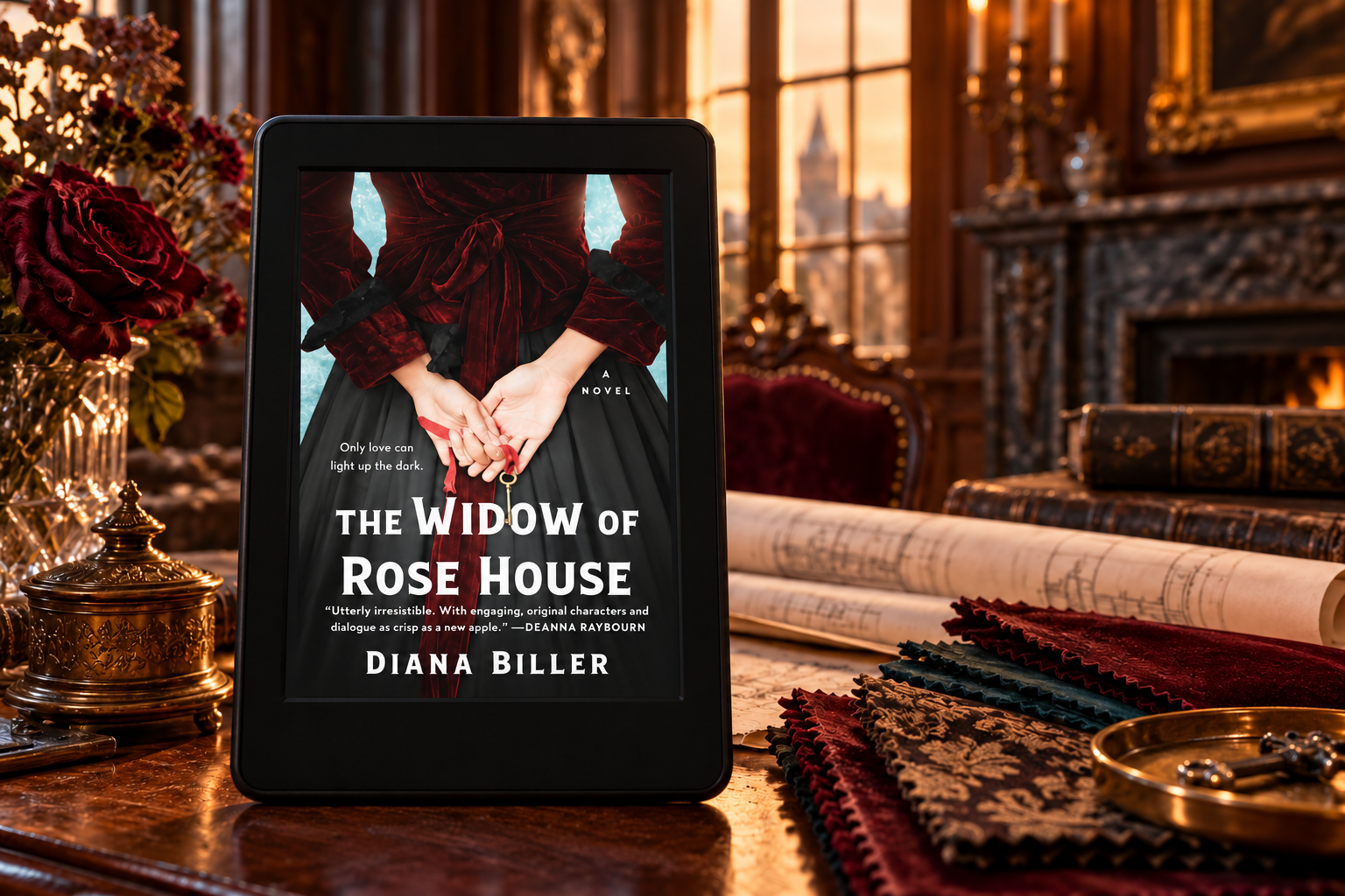 The Widow of Rose House by Diana Biller displayed on a Kindle beside restoration plans and fabric swatches.