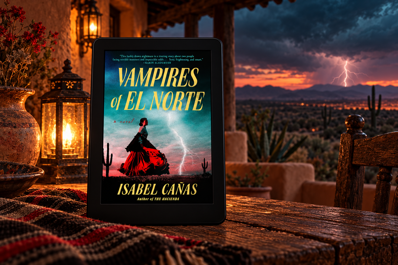 Vampires of El Norte by Isabel Cañas displayed on a Kindle on an adobe ranch veranda at stormy twilight.
